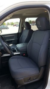 Dodge Ram 1500 aftermarket bed and exterior accessories in residential driveway